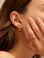 Gold frame earrings with carnelian cabochon and hammered texture — Winding Moonlight