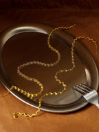 Gold rope-twisted spaghetti choker necklace with heart charm — Winding Moonlight