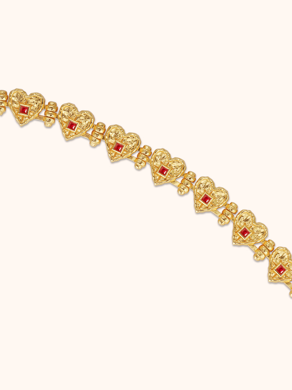 Gold hammered heart bracelet with square ruby centre and small beads — Winding Moonlight