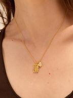 Gold coffee bean necklace with Amor bar pendant and zircon details — Winding Moonlight