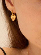 Gold hammered heart earrings with square ruby and starburst rays — Winding Moonlight