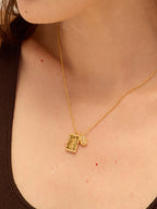 Gold coffee bean necklace with Amor bar pendant and zircon details — Winding Moonlight