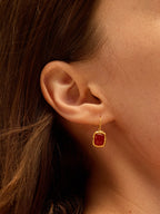 Gold frame earrings with carnelian cabochon and hammered texture — Winding Moonlight