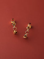 Gold sculptural C-shape portrait earrings with fluid curves — Winding Moonlight