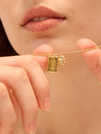 Gold coffee bean necklace with Amor bar pendant and zircon details — Winding Moonlight
