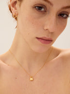 Dainty gold lock pendant necklace with sparkling zircon centre — Winding Moonlight
