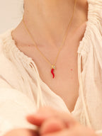 Gold chili pepper pendant necklace with red enamel and zircon-set oval — Winding Moonlight