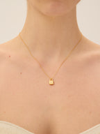 Dainty gold lock pendant necklace with sparkling zircon centre — Winding Moonlight