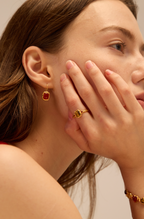 Gold flame ring with tiger's eye cabochon and red agate accents on hammered band — Winding Moonlight