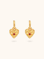Gold hammered heart earrings with square ruby and starburst rays — Winding Moonlight